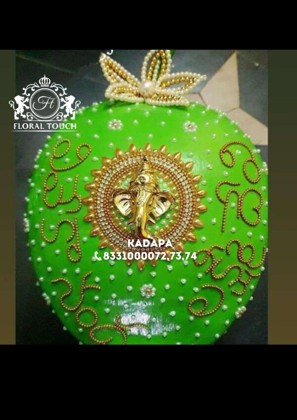 Handcrafted Ganesha Pelli Kobbari Bondam